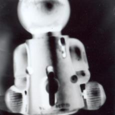 Ours mécanique, dos, cliché, sténopé, 1999.